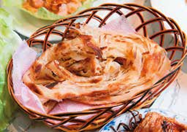 「一窝丝饼」口感酥脆，带着淡淡焦香。（摄影／李智为）