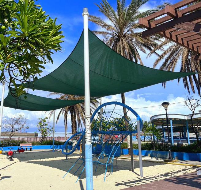 弥陀渔港海岸光廊-亲子戏沙池。（图／高雄市海洋局）