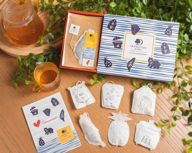 「台湾特色茶包礼盒」以天灯、台湾黑熊、香火袋、电锅等台湾意象插画作为包装设计，可爱讨喜的造型令人眼睛一亮。(台北中山九昱希尔顿逸林酒店提供)
