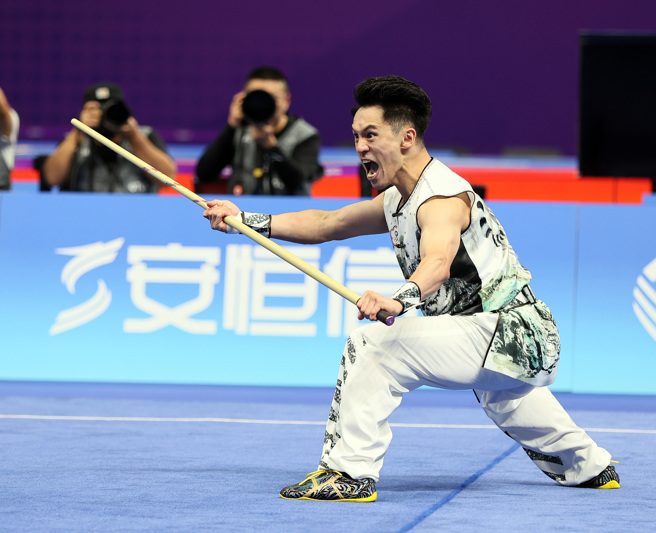 中华队赖柏玮在杭州亚运武术男子南拳南棍拿下第4名。（中华奥会提供）