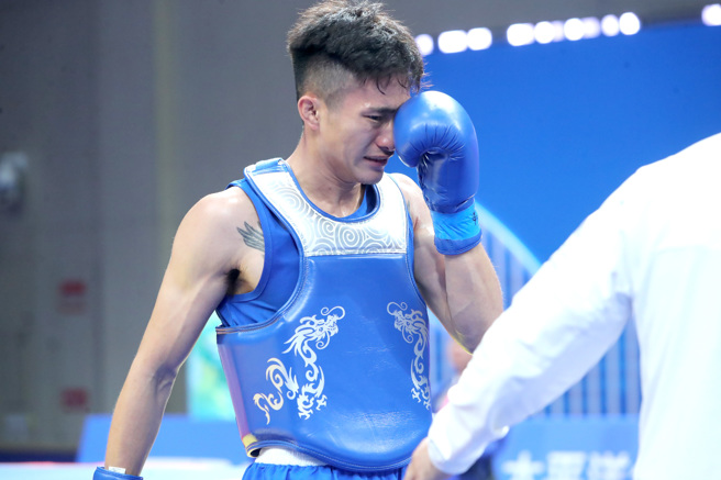 张焕宜在杭州亚运武术散打男子70公斤夺铜。（郑任南摄）