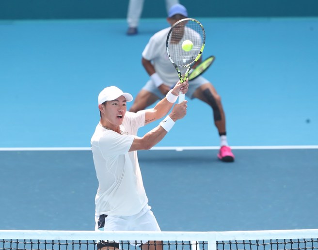 许育修搭檔庄吉生拿下男双金牌。(郑任南摄)