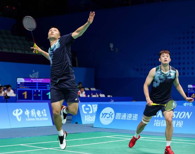李洋（左）、王齐麟晋级杭州亚运羽球男双16强。（Badminton Photo提供）