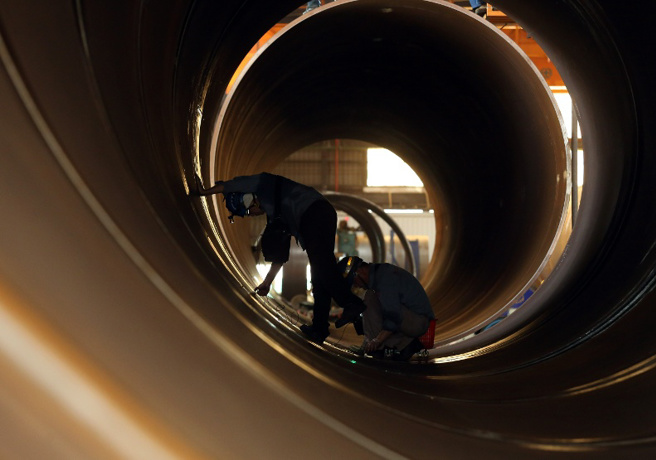 勞動部基本工資調漲，合計約有200萬名本國勞工受惠，占比不到全台勞工的1／5。（圖/遠見提供）