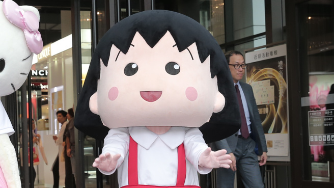 樱桃小丸子中的主角小丸子，即使是吉祥物、二创，也多以小学生的形象示人。(图／中时资料照)
