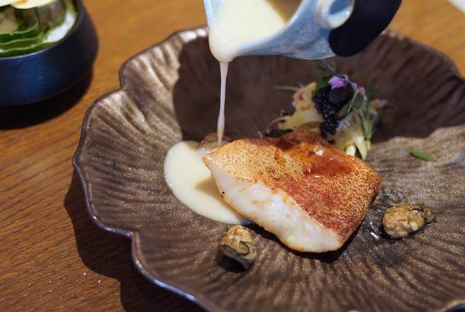 料理「人情调味的滋味」。（何书青摄）