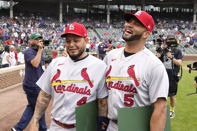 莫里纳（左）、普侯斯（Albert Pujols，右）同在去年退役。（美联社资料照）