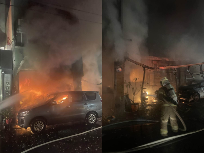佳里區中和街民宅20日凌晨4時許發生火警，台南市警消到場滅火，停在騎樓的汽車已付之一炬、1樓騎樓幾乎全燒毀。（讀者提供／程炳璋台南傳真）