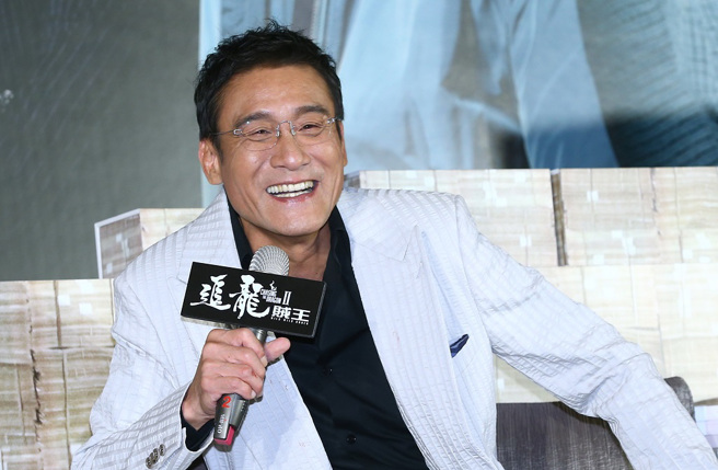 梁家辉搭乘飞机时被爆出私下真面目。(图/中时资料照)