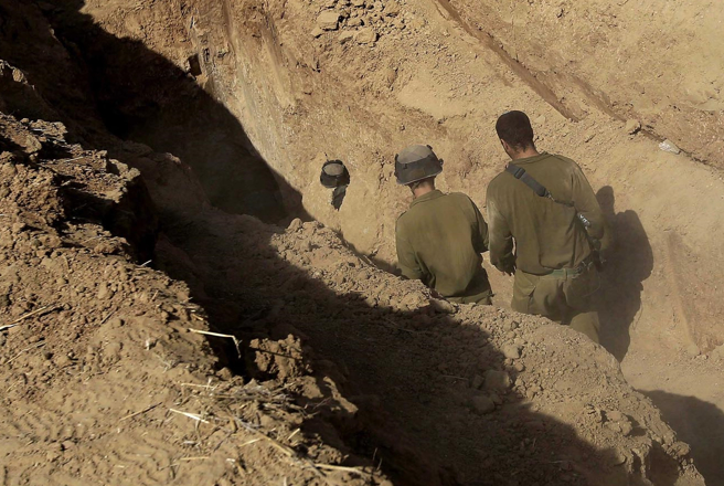 以军进入加萨边境附近哈玛斯地道的资料照。（美联社）