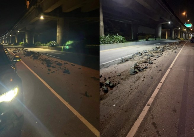 駕駛將現場馬路上都是土堆的照片PO網。（翻攝爆料公社）