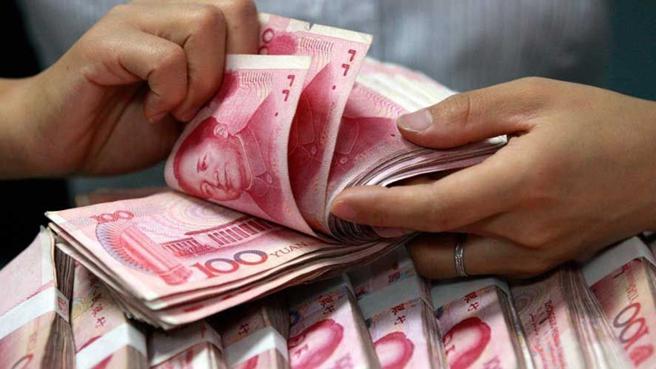 中央银行15日发布10月银行人民币存款余额，单月续减达人民币58.55亿元或4.1％，仅剩人民币1,368.05亿元。图／美联社