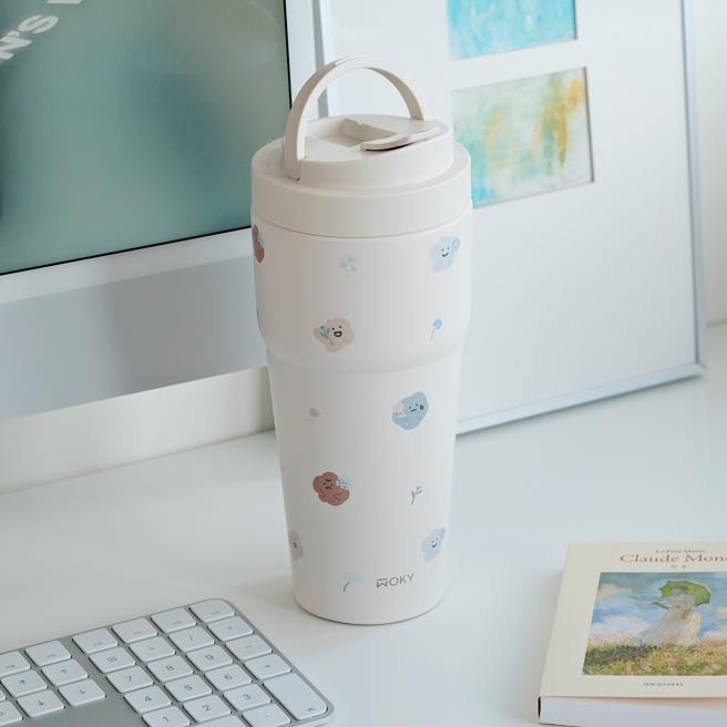 WOKY x 方坊 Square Studio 联名浑圆杯770ml，「小花喜怒哀乐」款式。（WOKY提供／古明弘台北传真）