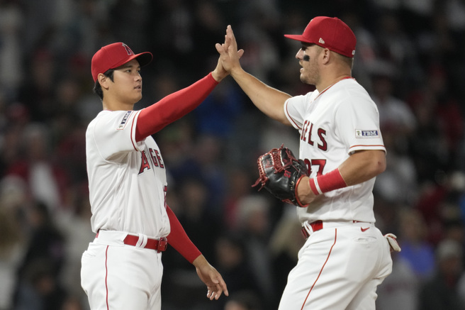 大谷翔平（左）、卓奧特（右）明年賽季可能拆夥。（美聯社資料照）