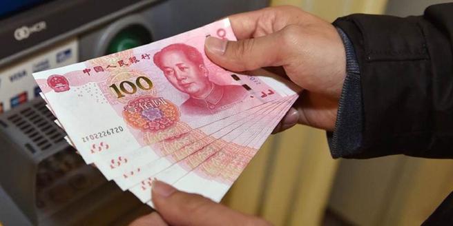 人民币兑美元中间价20日报7.1612元，升值116个基本点。图／新华社