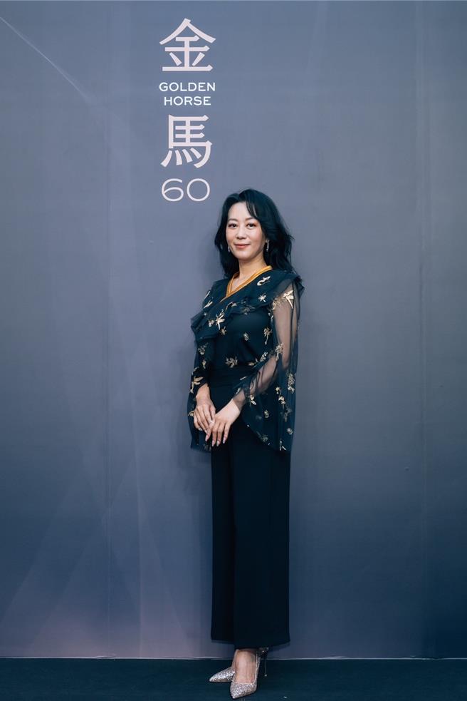 准影后胡怜亮丽登场，本人与片中苦情形象大相径庭。（金马提供）