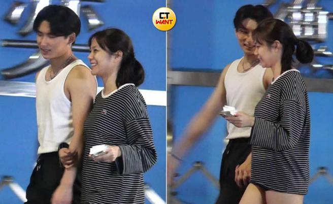 经纪人顺势勾住范范的手臂，随后两人更十指紧扣，互看彼此的眼神充满爱意。（图／本刊摄影组）