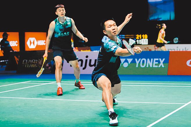 李洋（右）王齐麟（左）在深圳大师赛男双8强止步，图为2人在韩国公开赛资料照。（Badminton Photo提供）