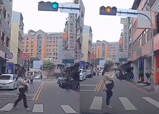 一位大媽不僅闖紅燈滑手機外，還突然停在路中央，嚇得要通過路的車輛燈煞停等她。（ 圖／ 翻攝自「WoWtchout-地圖型行車影像分享平台」）