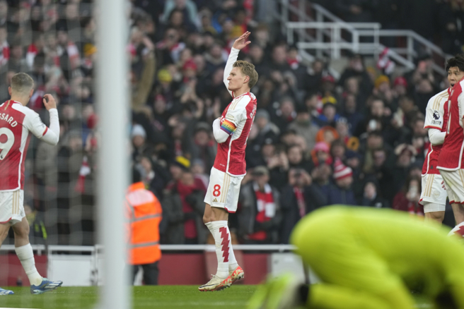 兵工厂Martin Odegaard庆祝进球。（美联社资料照）