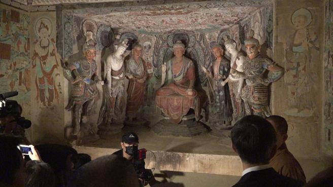 敦煌莫高窟是融合建筑、雕塑、壁画于一体的立体艺术。（赖君欣摄）