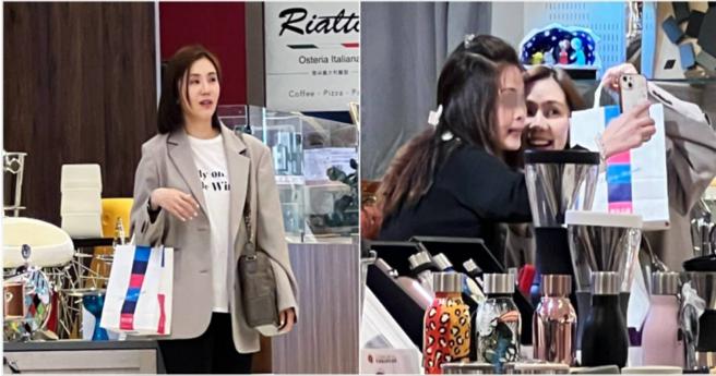 日前有讀者在北市信義區百貨巧遇王宇婕，她在家飾品專櫃跟櫃姐聊得很開心，很親民地貼臉合照。（圖／讀者提供）