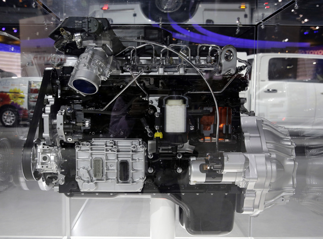 美國引擎製造商康明斯（Cummins）公司被控為卡車或皮卡加裝能騙過防汙減排的裝置而觸法。美國司法部今天表示，業者與聯邦、加州政府達成和解，將支付16億美元罰金。(圖/ 美聯社)