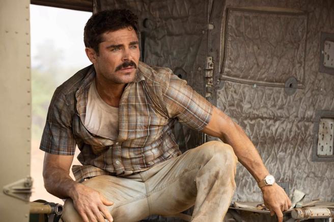 查克艾弗隆在新作《铁爪》中有巨大转变。图为柴克艾弗隆主演《在前线乾杯》剧照。（资料照／Apple TV+提供）