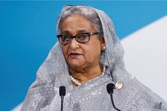 孟加拉7日舉行國民議會選舉，總理哈希納（Sheikh Hasina）領導的政黨已拿下過半席次，預計她將迎來第5個任期。（路透社）