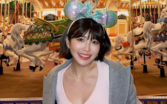 壯壯性感OL裝扮洩火辣S身形 超深事業線引遐想