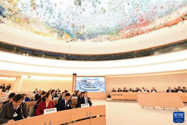 人權理事會國別人權審議工作組通過參加審議報告，陳旭：這次考了好成績。（新華社）