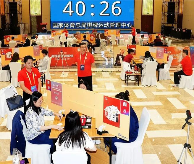 發源於江蘇淮安的牌類遊戲「摜蛋」，成為金融圈甚至延伸到各領域的新社交密碼。（新華社）