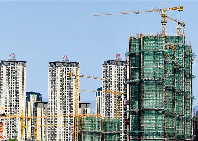 1月大陆百强房企拿地总额856亿元人民币，较去年同期大幅增长44.8％。（图／中新社）