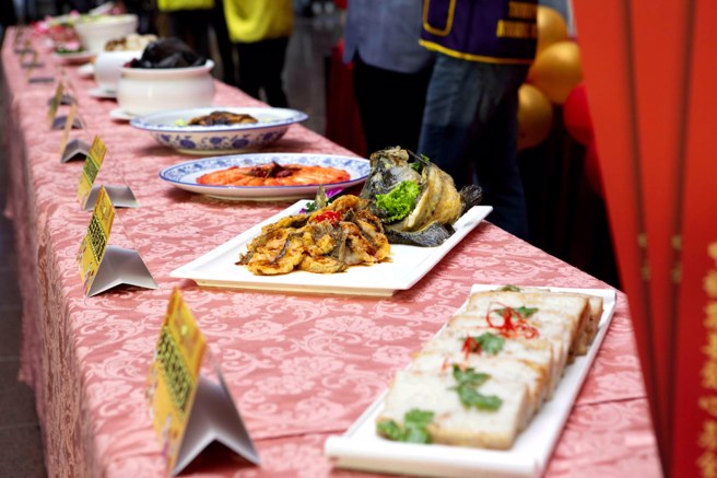      




臺北市政府社會局「溫馨年菜‧愛心快遞」活動，募集2,000份年菜送給弱勢族群。(圖/永慶房產集團提供)
