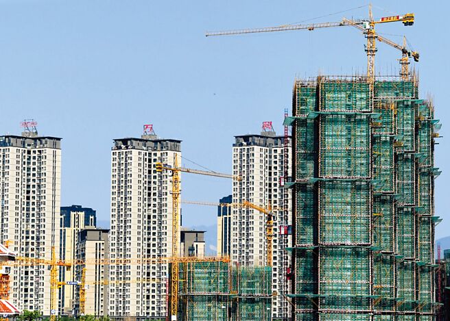 中骏集团披露，已有10多个项目入列第一批「白名单」，另有20多个项目在推进中。图／中新社