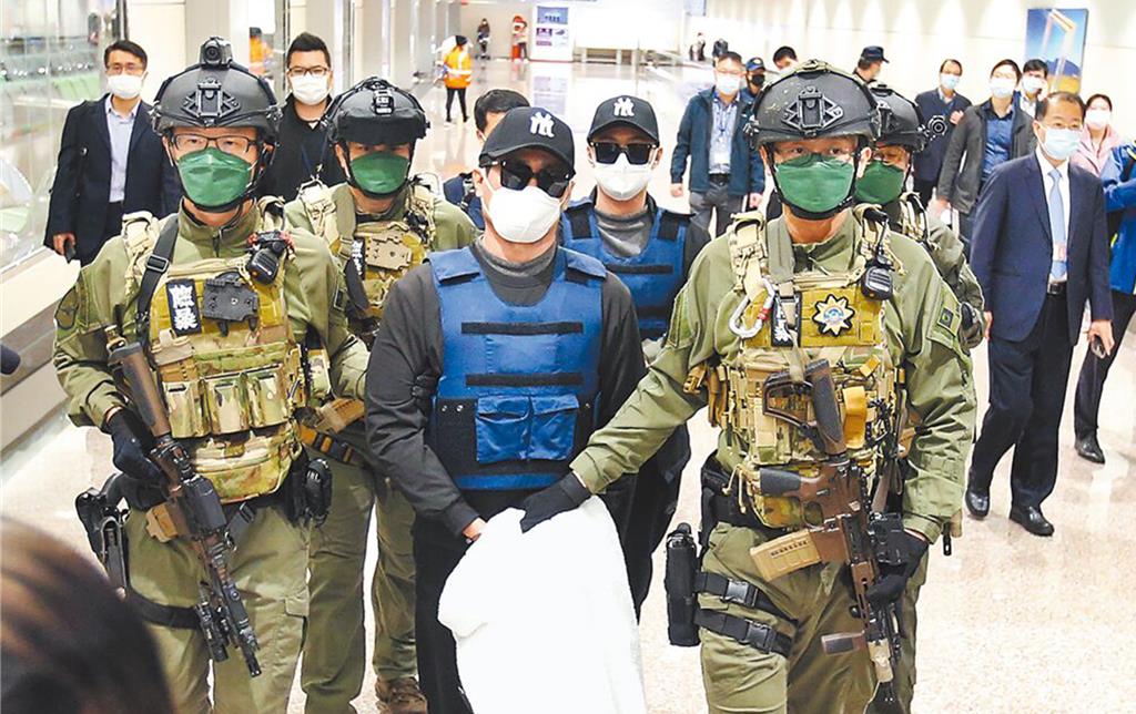 台南學甲88槍擊案主嫌洪政軍及槍手孔祥志被押解回台。（本報資料照片）