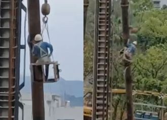 驚悚片曝光！汐止工人掛半空中無防護 突撞重型機具「瞬間歪斜」