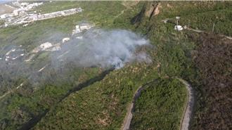 綠島氣象站產業道路燃無名火 黑鷹直升機灑水控制