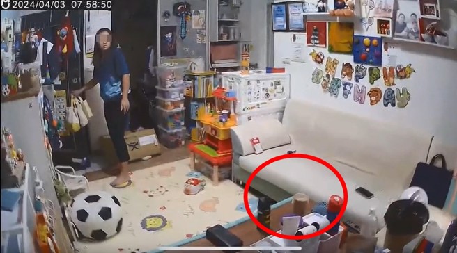 403地震發生當時，妻子優先搶救奶茶的監視器畫面，被老公PO在網路上爆料。（翻攝爆料公社）