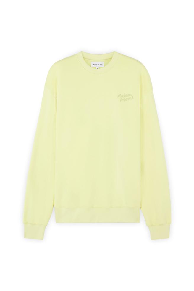 Maison Kitsuné 鹅黄色手绘LOGO舒适卫衣，9100元。（Maison Kitsuné提供）