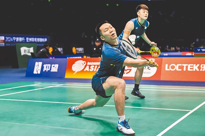 李洋（前）、王齐麟11日在亚洲羽球锦标赛男双16强赛直落2获胜，晋级8强。（Badminton Photo提供）
