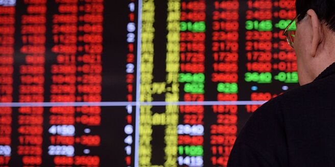 ETF热潮席卷全台，连外资、公股法人的买盘都积极转进，形成关键撑盘力道。图／本报资料照片