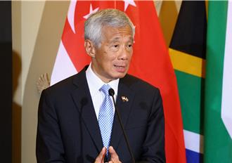 李显龙染流感失约苹果执行长 消息称库克将见黄循财