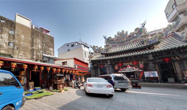 嘉义市府日前代为标售日治时期「祭祀公业罗兴乔」名下2笔紧邻嘉义城隍庙庙埕两笔土地，由城隍庙庙方标下，其中一笔换算每坪116万元。（取自google街景地图／吕妍庭嘉义传真）