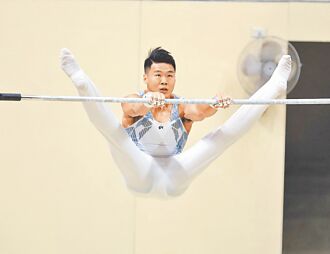 体操世界杯》体操与轻艇 替中华队再添3奥运门票