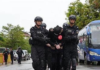 陸打擊跨境犯罪再添戰果 250名電詐嫌犯自寮國移交中方