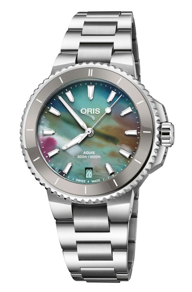 ORIS Aquis 36.5mm 日期腕表，表盤以回收魚網再製而成，約8萬元。（ORIS提供）