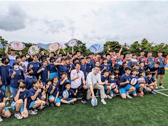 暖中草皮橄榄球场落成启用 谢国梁：致力推动三级衔接