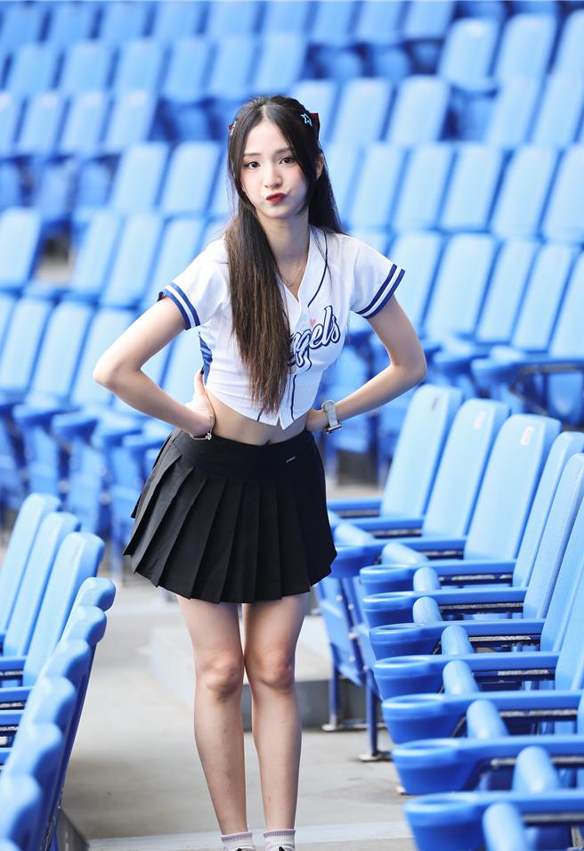 洁洁日渐喜欢啦啦队工作。（陈俊吉摄）