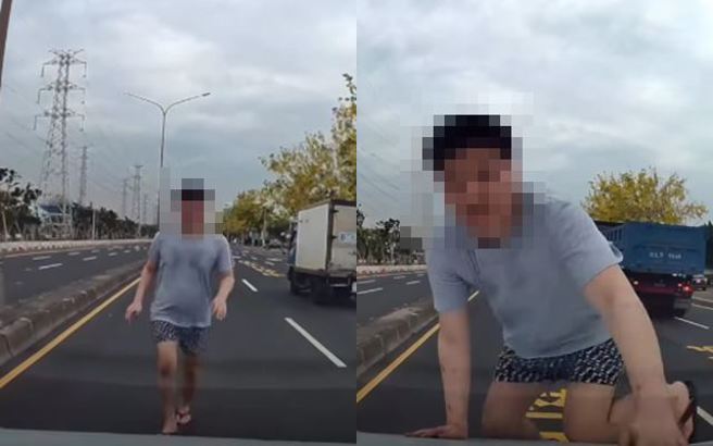 有男子今(14)日上午在高雄小港沿海路随机找车跳上引擎盖，吓得路上驾驶吓坏纷纷闪避。（图／翻摄自脸书爆废公社）
